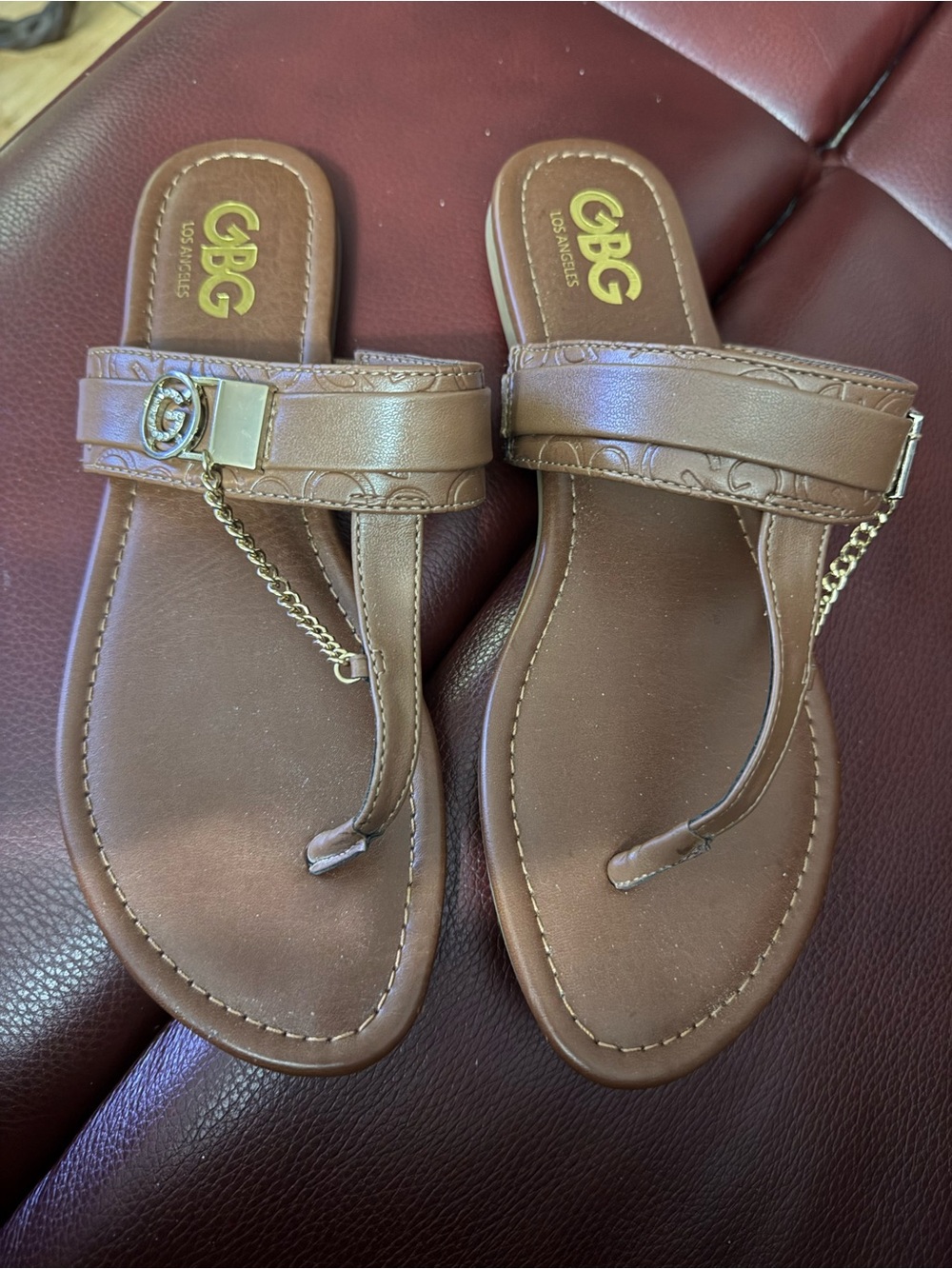 GBG Los Angeles Brown Thong Sandals with Gold Chain Accent